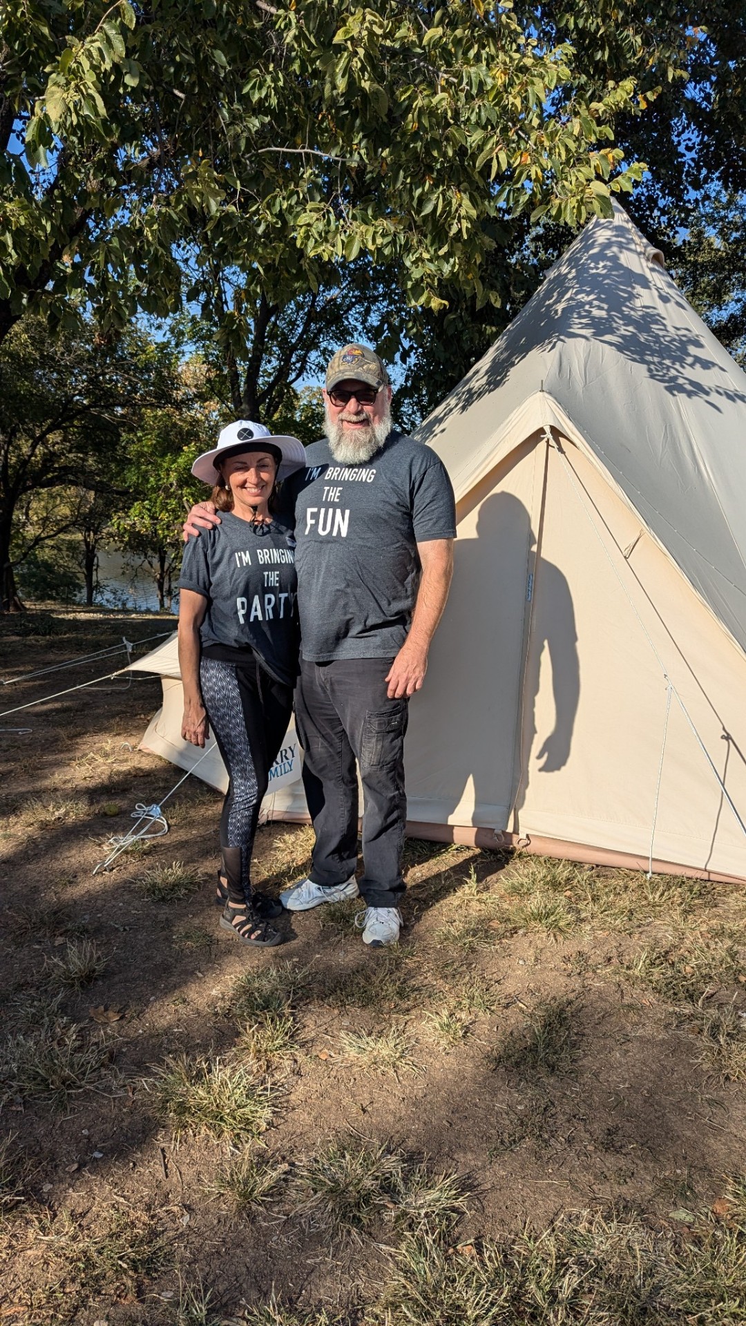 Ginger and Jerry O'Dwyer standing beside a canvas tent at MySBC